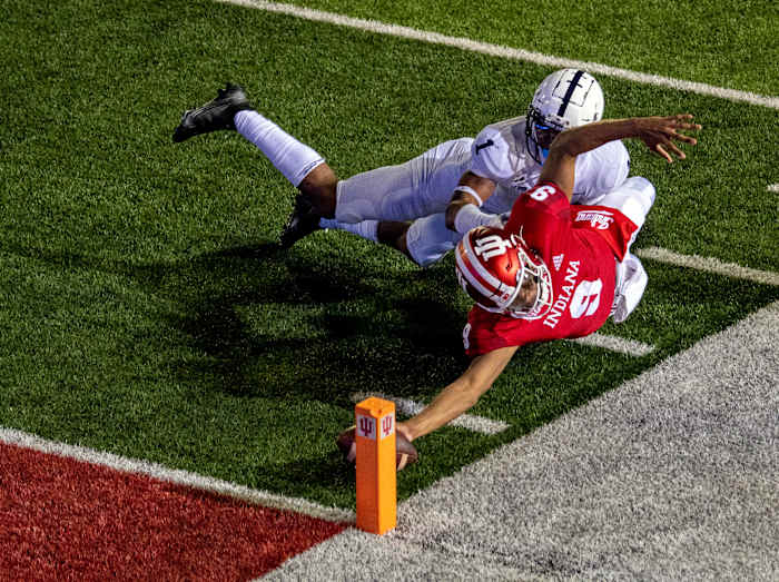 Indiana Hoosiers quarterback Michael Penix Jr. (9) dives with the ball to score a two point conversion and win the game in overtime during the game at Memorial Stadium.